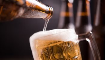 glass_bottles_beer_with_glass_ice_dark_background-23394323